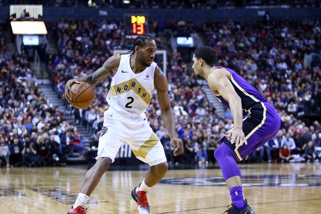 TORONTO, ON - MARCH 14:  Kawhi Leonard #2 of the Toronto Raptors dribbles the ball as Josh Hart #3 of the Los Angeles Lakers defends during the second half of an NBA game at Scotiabank Arena on March 14, 2019 in Toronto, Canada.  NOTE TO USER: User expressly acknowledges and agrees that, by downloading and or using this photograph, User is consenting to the terms and conditions of the Getty Images License Agreement.  (Photo by Vaughn Ridley/Getty Images)