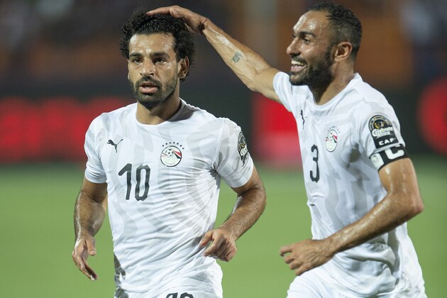 CAIRO, EGYPT - JUNE 30: Mohamed Salah of Egypt celebrates his goal with Ahmed El Mohamady during the 2019 Africa Cup of Nations Group A match between Uganda and Egypt at Cairo International Stadium on June 30, 2019 in Cairo, Egypt. (Photo by Visionhaus)