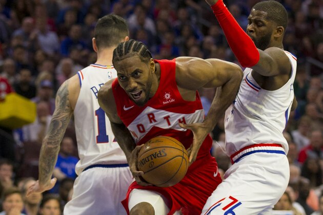 PHILADELPHIA, PA - MAY 09: Kawhi Leonard #2 of the Toronto Raptors controls the ball against JJ Redick #17 and James Ennis III #11 of the Philadelphia 76ers in Game Six of the Eastern Conference Semifinals at the Wells Fargo Center on May 9, 2019 in Philadelphia, Pennsylvania. The 76ers defeated the Raptors 112-101. NOTE TO USER: User expressly acknowledges and agrees that, by downloading and or using this photograph, User is consenting to the terms and conditions of the Getty Images License Agreement. (Photo by Mitchell Leff/Getty Images)