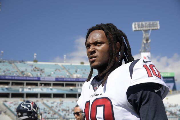Houston Texans wide receiver DeAndre Hopkins (10) warms up before an NFL football game against the Jacksonville Jaguars Sunday, Oct. 21, 2018, in Jacksonville, Fla. (AP Photo/Phelan M. Ebenhack)