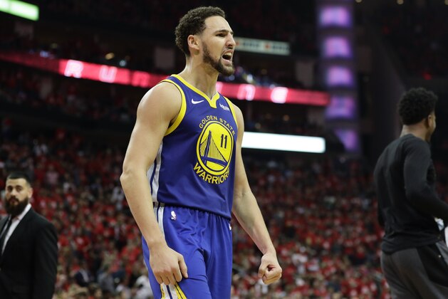 Golden State Warriors guard Klay Thompson celebrates the team's win over the Houston Rockets in Game 6 of a second-round NBA basketball playoff series Friday, May 10, 2019, in Houston. Golden State won 118-113, winning the series. (AP Photo/Eric Gay)
