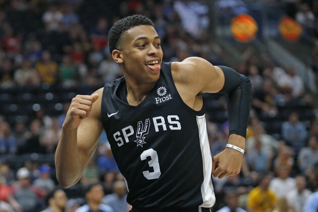 San Antonio Spurs guard Keldon Johnson (3) celebrates after scoring against the Memphis Grizzlies during the second half of an NBA Summer League basketball game Tuesday, July 2, 2019, in Salt Lake City. (AP Photo/Rick Bowmer)