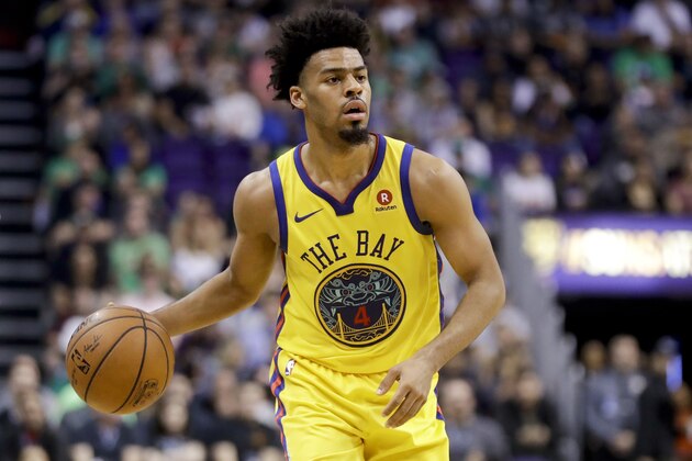 Golden State Warriors guard Quinn Cook plays against the Phoenix Suns during an NBA basketball game in Phoenix, Sunday, March 18, 2018. (AP Photo/Chris Carlson)