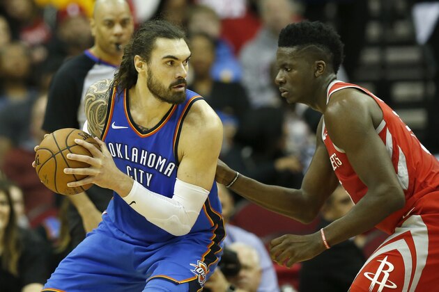 HOUSTON, TX - APRIL 07:  Clint Capela #15 of the Houston Rockets defends Steven Adams #12 of the Oklahoma City Thunder in the first half at Toyota Center on April 7, 2018 in Houston, Texas.  NOTE TO USER: User expressly acknowledges and agrees that, by downloading and or using this Photograph, user is consenting to the terms and conditions of the Getty Images License Agreement.  (Photo by Tim Warner/Getty Images)