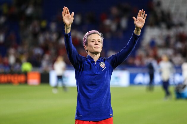 LYON, FRANCE - JULY 02: #15 Megan Rapinoe of USA thanks the fans after the 2019 FIFA Women's World Cup France Semi Final match between England and USA at Stade de Lyon on July 02, 2019 in Lyon, France. (Photo by Zhizhao Wu/Getty Images)