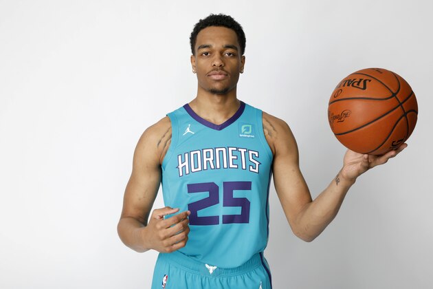 CHARLOTTE, NORTH CAROLINA  - JUNE 21:  PJ Washington Jr. of the Charlotte Hornets poses for a portrait on June 21, 2019 at Spectrum Center in Charlotte, North Carolina. NOTE TO USER: User expressly acknowledges and agrees that, by downloading and/or using this photograph, user is consenting to the terms and conditions of the Getty Images License Agreement. Mandatory Copyright Notice: Copyright 2019 NBAE (Photo by Bob Leverone/NBAE via Getty Images)