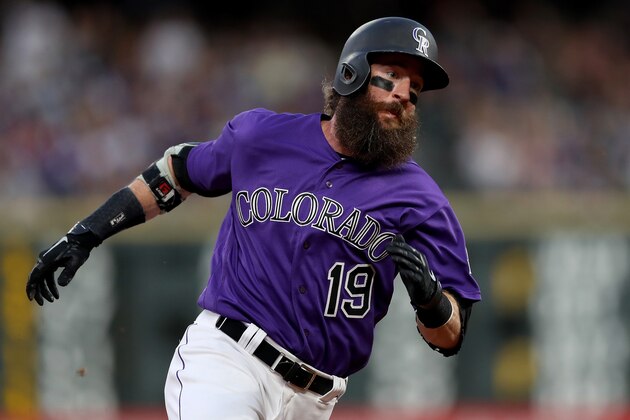 DENVER, COLORADO - JUNE 29: Charlie Blackmon #19 of the Colorado Rockies scores on a Nolan Arenado single in the sixth inning against the Los Angeles Dodgers at Coors Field on June 29, 2019 in Denver, Colorado. (Photo by Matthew Stockman/Getty Images)