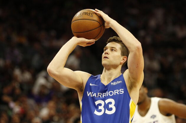 In this photo taken Monday July 1, 2019, Golden State Warriors guard Jimmer Fredette shoots a free throw during the first half of an NBA basketball summer league game against the Sacramento Kings in Sacramento, Calif. The Kings won 81-77. (AP Photo/Rich Pedroncelli)