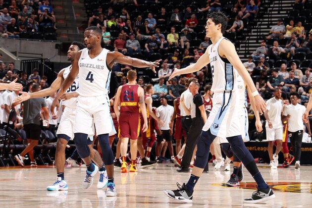 SALT LAKE CITY, UT - JULY 3: Yuta Watanabe #18 of the Memphis Grizzlies and Julian Washburn #4 of the Memphis Grizzlies high five during the game against the Cleveland Cavaliers on July 3, 2019 at vivint.SmartHome Arena in Salt Lake City, Utah. NOTE TO USER: User expressly acknowledges and agrees that, by downloading and/or using this photograph, user is consenting to the terms and conditions of the Getty Images License Agreement. Mandatory Copyright Notice: Copyright 2019 NBAE (Photo by Melissa Majchrzak/NBAE via Getty Images)