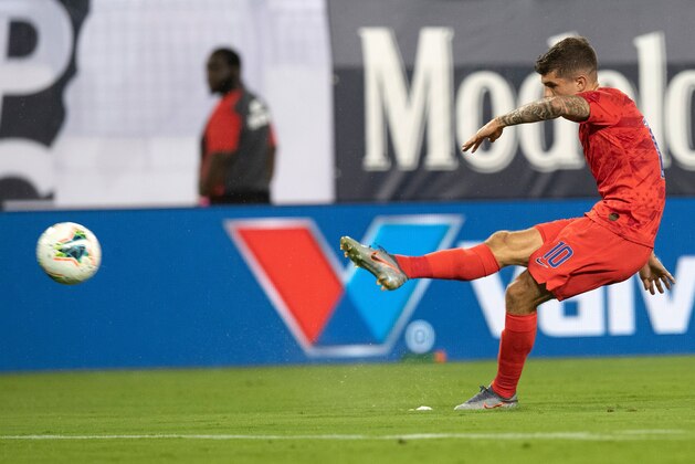 USA's midfielder Christian Pulisic shoots the ball during their CONCACAF Gold Cup semi-final football match against Jamaica at Nissan Stadium in Nashville, Tennessee, on July 3, 2019. (Photo by Jim WATSON / AFP)        (Photo credit should read JIM WATSON/AFP/Getty Images)