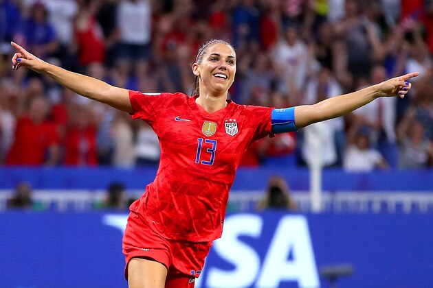 LYON, FRANCE - JULY 02: Alex Morgan of the USA celebrates after scoring her team's second goal during the 2019 FIFA Women's World Cup France Semi Final match between England and USA at Stade de Lyon on July 02, 2019 in Lyon, France. (Photo by Richard Heathcote/Getty Images)