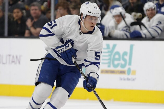 Toronto Maple Leafs defenseman Jake Gardiner (51) plays against the Vegas Golden Knights during the first period of an NHL hockey game Thursday, Feb. 14, 2019, in Las Vegas. (AP Photo/John Locher)
