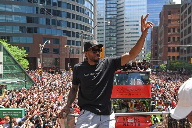 TORONTO, ON - JUNE 17: Kawhi Leonard #2 of the Toronto Raptors acknowledges the crowd during the Toronto Raptors Championship Victory Parade on June 17, 2019 in Toronto, Ontario. NOTE TO USER: User expressly acknowledges and agrees that, by downloading and/or using this photograph, user is consenting to the terms and conditions of Getty Images License Agreement. Mandatory Copyright Notice: Copyright 2019 NBAE (Photo by Ron Turenne/NBAE via Getty Images)