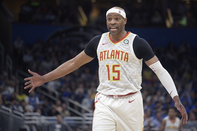 Atlanta Hawks forward Vince Carter (15) argues with an official during the first half of an NBA basketball game against the Orlando Magic Friday, April 5, 2019, in Orlando, Fla. (AP Photo/Phelan M. Ebenhack)
