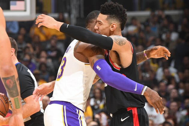 LOS ANGELES, CA - NOVEMBER 4:  LeBron James #23 of the Los Angeles Lakers and Danny Green #14 of the Toronto Raptors exchange a hug during the game on November 4, 2018 at Staples Center in Los Angeles, California. NOTE TO USER: User expressly acknowledges and agrees that, by downloading and/or using this Photograph, user is consenting to the terms and conditions of the Getty Images License Agreement. Mandatory Copyright Notice: Copyright 2018 NBAE (Photo by Andrew D. Bernstein/NBAE via Getty Images)