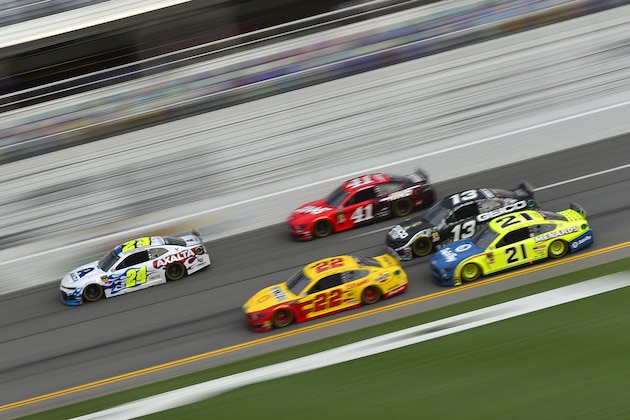 DAYTONA BEACH, FLORIDA - JULY 04: William Byron, driver of the #24 Axalta Patriotic Chevrolet, leads a pack of cars during practice for the Monster Energy NASCAR Cup Series Coke Zero Sugar 400 at Daytona International Speedway on July 04, 2019 in Daytona Beach, Florida. (Photo by Jeff Curry/Getty Images)