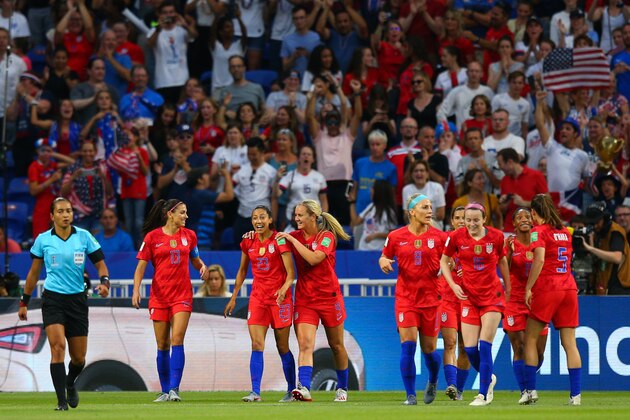 LYON, FRANCE - JULY 02: Christen Press of USA celebrates scoring the opening goal with team-mates during the 2019 FIFA Women's World Cup France Semi Final match between England and USA at Stade de Lyon on July 2, 2019 in Lyon, France. (Photo by Craig Mercer/MB Media/Getty Images)