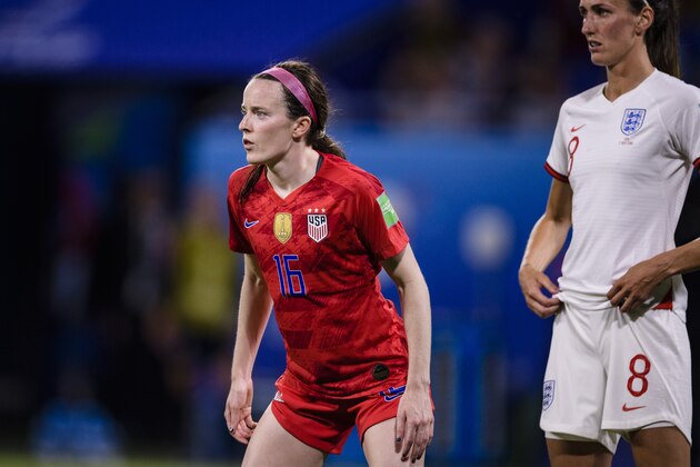 LYON, FRANCE - JULY 02: Rose Lavelle of United States (L) in action during the 2019 FIFA Women's World Cup France Semi Final match between England and USA at Stade de Lyon on July 2, 2019 in Lyon, France. (Photo by Marcio Machado/Getty Images)