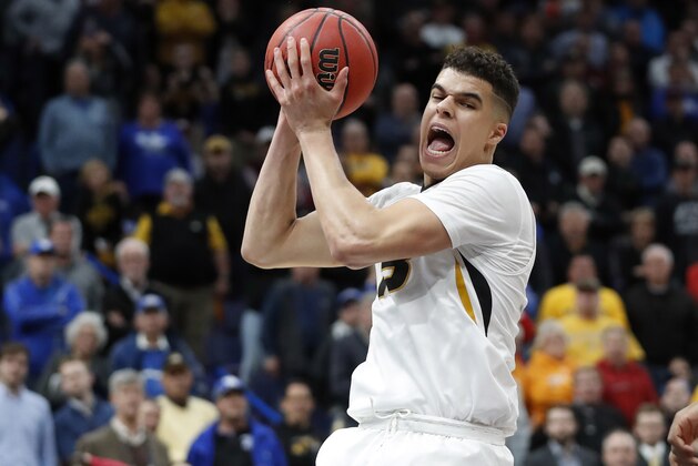 FILE - In this March 8, 2018, file photo, Missouri's Michael Porter Jr. pulls down a rebound during the second half in an NCAA college basketball game against Georgia at the Southeastern Conference tournament, in St. Louis. Michael Porter Jr. played in three games in college because of back problems, but his talent has long been considered more than NBA-ready. He is the epitome of high-risk, high-reward in this draft. (AP Photo/Jeff Roberson, File)