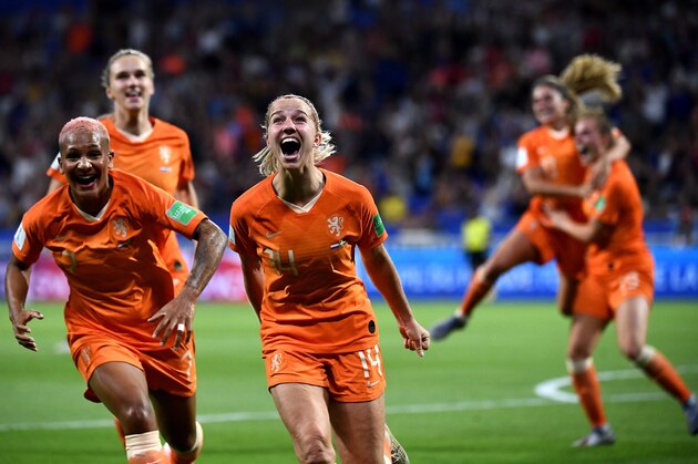 Netherlands' midfielder Jackie Groenen (C) is congratulated by teammates after scoring a goal during the France 2019 Women's World Cup semi-final football match between the Netherlands and Sweden, on July 3, 2019, at the Lyon Stadium in Decines-Charpieu, central-eastern France. (Photo by FRANCK FIFE / AFP)        (Photo credit should read FRANCK FIFE/AFP/Getty Images)