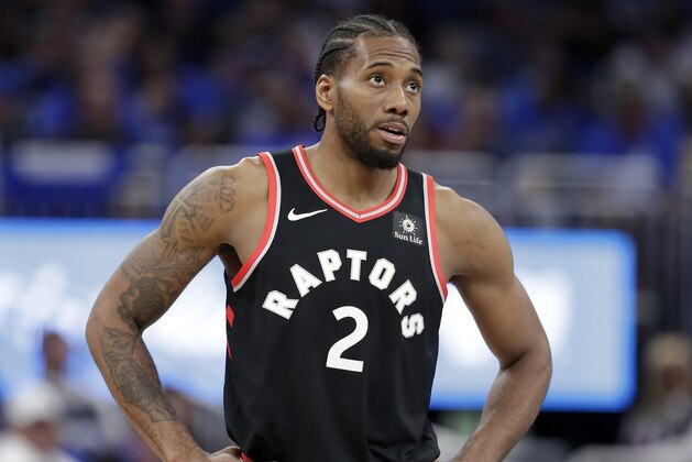 Toronto Raptors' Kawhi Leonard walks to the free throw line after he was fouled during the second half in Game 4 of a first-round NBA basketball playoff series against the Orlando Magic, Sunday, April 21, 2019, in Orlando, Fla. (AP Photo/John Raoux)