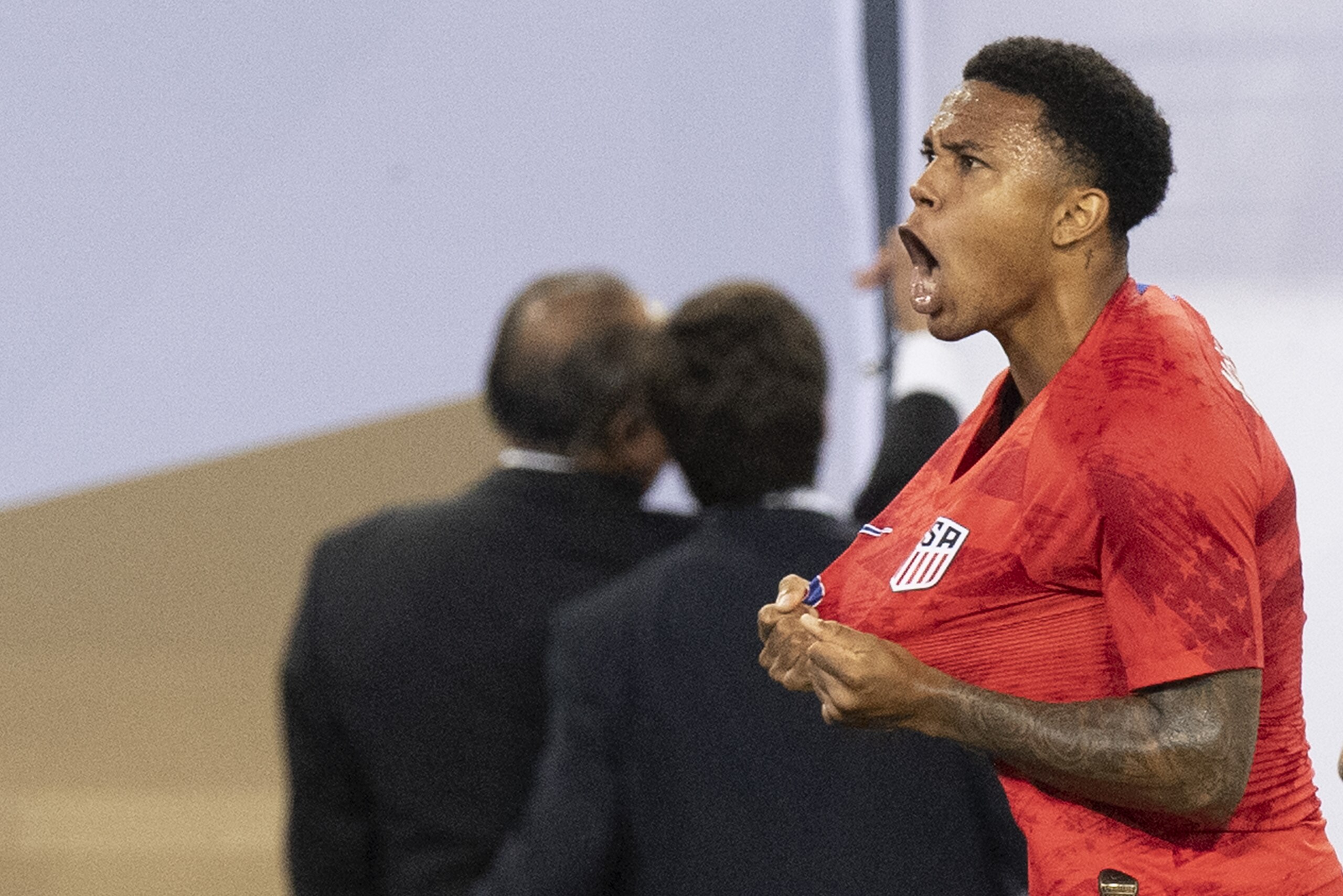 USA's midfielder Weston McKennie (L) celebrates after scoring a goal against Jamaica during their CONCACAF Gold Cup semi-final football match at Nissan Stadium in Nashville, Tennessee, on July 3, 2019. (Photo by Jim WATSON / AFP)        (Photo credit should read JIM WATSON/AFP/Getty Images)