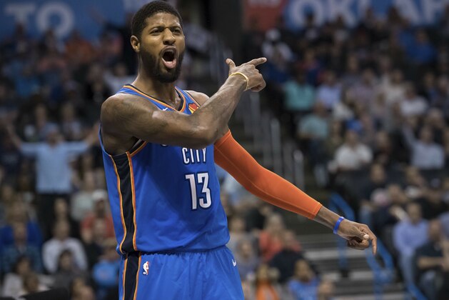 Oklahoma City Thunder forward Paul George (13) questions a call during the second half of the team's NBA basketball game against the Indiana Pacers on Wednesday, March 27, 2019, in Oklahoma City. (AP Photo/Rob Ferguson)