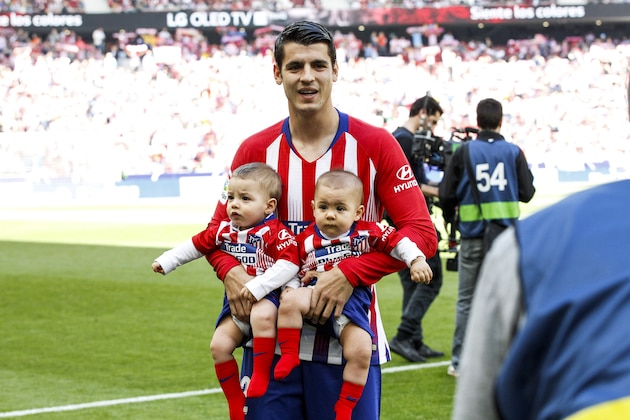 MADRID, SPAIN - APRIL 27: Alvaro Morata of Atletico Madrid with his sons during the La Liga Santander  match between Atletico Madrid v Real Valladolid at the Estadio Wanda Metropolitano on April 27, 2019 in Madrid Spain (Photo by David S. Bustamante/Soccrates/Getty Images)