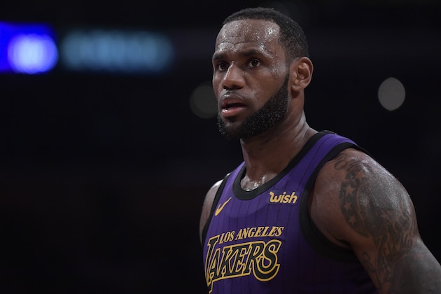 Los Angeles Lakers forward LeBron James stands on the court during the second half of an NBA basketball game against the Brooklyn Nets Friday, March 22, 2019, in Los Angeles. The Nets won 111-106. (AP Photo/Mark J. Terrill)