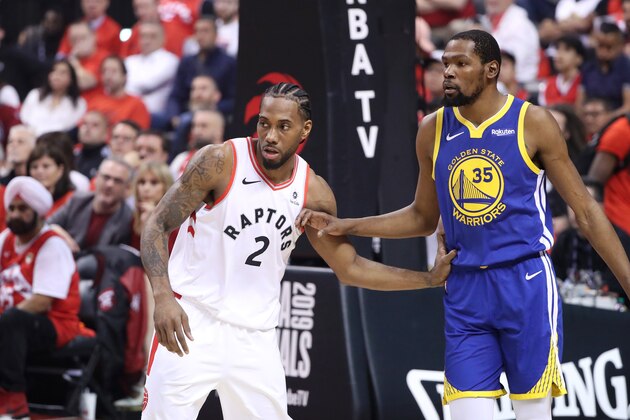 TORONTO, CANADA - JUNE 10:  Kawhi Leonard #2 of the Toronto Raptors defends Kevin Durant #35 of the Golden State Warriors during Game Five of the NBA Finals on June 10, 2019 at Scotiabank Arena in Toronto, Ontario, Canada. NOTE TO USER: User expressly acknowledges and agrees that, by downloading and/or using this photograph, user is consenting to the terms and conditions of the Getty Images License Agreement. Mandatory Copyright Notice: Copyright 2019 NBAE (Photo by Joe Murphy/NBAE via Getty Images)