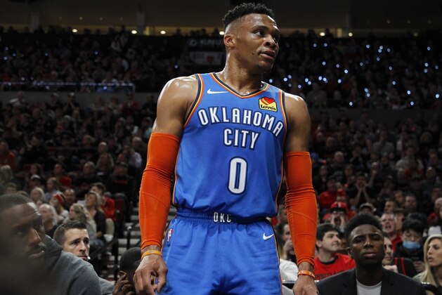 Oklahoma City Thunder guard Russell Westbrook interacts with the crowd during the first half of Game 1 of a first-round NBA basketball playoff series against the Portland Trail Blazers in Portland, Ore., Sunday, April 14, 2019. (AP Photo/Steve Dipaola)