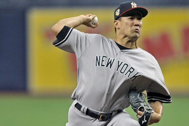 New York Yankees starter Masahiro Tanaka pitches against the Tampa Bay Rays during the first inning of a baseball game Friday, July 5, 2019, in St. Petersburg, Fla. (AP Photo/Steve Nesius)