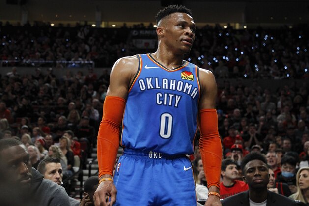 Oklahoma City Thunder guard Russell Westbrook interacts with the crowd during the first half of Game 1 of a first-round NBA basketball playoff series against the Portland Trail Blazers in Portland, Ore., Sunday, April 14, 2019. (AP Photo/Steve Dipaola)