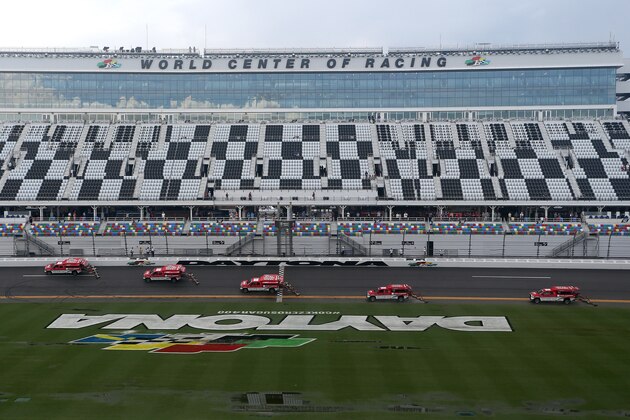 DAYTONA BEACH, FLORIDA - JULY 06: The NASCAR Air Titan Track Drying Team works on the track before the Monster Energy NASCAR Cup Series Coke Zero Sugar 400 at Daytona International Speedway on July 06, 2019 in Daytona Beach, Florida. (Photo by Brian Lawdermilk/Getty Images)