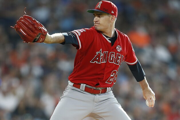 HOUSTON, TEXAS - JULY 06: Andrew Heaney #28 of the Los Angeles Angels of Anaheim pitches in the first inning against the Houston Astros at Minute Maid Park on July 06, 2019 in Houston, Texas. (Photo by Bob Levey/Getty Images)