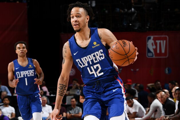 LAS VEGAS, NV - JULY 6: Amir Coffey #42 of the LA Clippers handles the ball against the Los Angeles Lakers during Day 2 of the 2019 Las Vegas Summer League on July 6, 2019 at the Thomas & Mack Center in Las Vegas, Nevada. NOTE TO USER: User expressly acknowledges and agrees that, by downloading and or using this Photograph, user is consenting to the terms and conditions of the Getty Images License Agreement. Mandatory Copyright Notice: Copyright 2019 NBAE (Photo by Garrett Ellwood/NBAE via Getty Images)