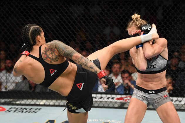 LAS VEGAS, NV - JULY 06: Amanda Nunes of Brazil kicks Holly Holm in their UFC bantamweight championship fight during the UFC 239 event at T-Mobile Arena on July 6, 2019 in Las Vegas, Nevada.  (Photo by Josh Hedges/Zuffa LLC/Zuffa LLC)