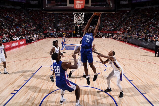LAS VEGAS, NV - JULY 6: Mfiondu Kabengele #25 of the LA Clippers dunks the ball against the Los Angeles Lakers during Day 2 of the 2019 Las Vegas Summer League on July 6, 2019 at the Thomas & Mack Center in Las Vegas, Nevada. NOTE TO USER: User expressly acknowledges and agrees that, by downloading and or using this Photograph, user is consenting to the terms and conditions of the Getty Images License Agreement. Mandatory Copyright Notice: Copyright 2019 NBAE (Photo by Garrett Ellwood/NBAE via Getty Images)