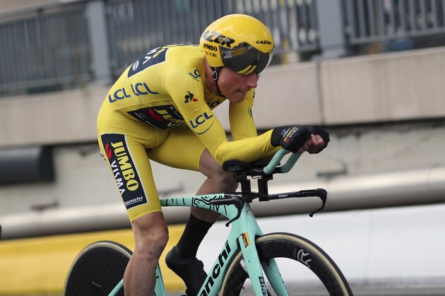 Netherlands' Mike Teunissen of the Team Jumbo Visma strains during the second stage of the Tour de France cycling race, a team time trial over 27.6 kilometers (17 miles) with start and finish in Brussels, Belgium, Sunday, July 7, 2019. (AP Photo/Thibault Camus)
