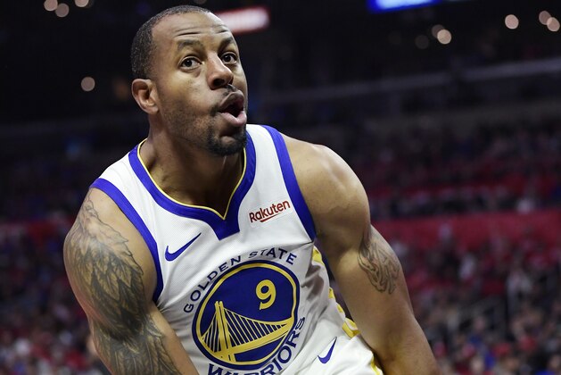 Golden State Warriors guard Andre Iguodala, right, reacts after dunking during the second half in Game 4 of a first-round NBA basketball playoff series against the Los Angeles Clippers Sunday, April 21, 2019, in Los Angeles. The Warriors won 113-105. (AP Photo/Mark J. Terrill)