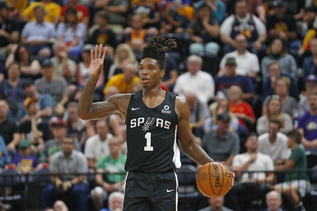 San Antonio Spurs guard Lonnie Walker lV brings the ball up during the second half of an NBA summer league basketball game against the Utah Jazz on Wednesday, July 3, 2019, in Salt Lake City. (AP Photo/Rick Bowmer)
