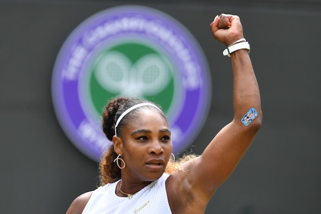 US player Serena Williams gestures during a game against Spain's Carla Suarez Navarro during their women's singles fourth round match on the seventh day of the 2019 Wimbledon Championships at The All England Lawn Tennis Club in Wimbledon, southwest London, on July 8, 2019. (Photo by GLYN KIRK / AFP) / RESTRICTED TO EDITORIAL USE        (Photo credit should read GLYN KIRK/AFP/Getty Images)