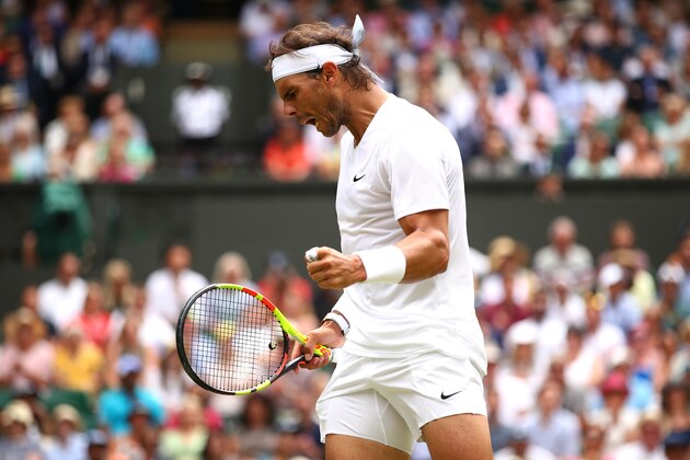 LONDON, ENGLAND - JULY 08:  Rafael Nadal of Spain celebrates in his Men's Singles fourth round match against Joao Sousa of Portugal during Day Seven of The Championships - Wimbledon 2019 at All England Lawn Tennis and Croquet Club on July 08, 2019 in London, England. (Photo by Clive Brunskill/Getty Images)