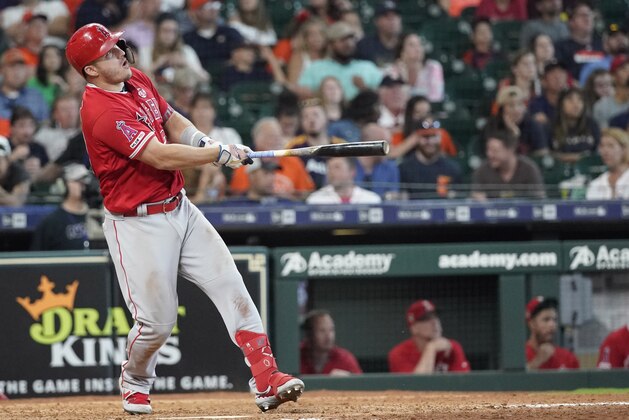 Los Angeles Angels' Mike Trout hits a two-run home run against the Houston Astros during the eighth inning of a baseball game Sunday, July 7, 2019, in Houston. (AP Photo/David J. Phillip)
