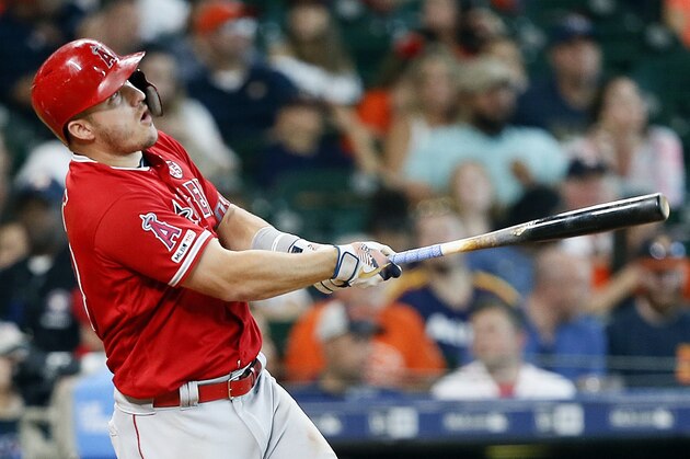 HOUSTON, TEXAS - JULY 07: Mike Trout #27 of the Los Angeles Angels of Anaheim hits a two-run home run in the eighth inning Houston Astros at Minute Maid Park on July 07, 2019 in Houston, Texas. (Photo by Bob Levey/Getty Images)