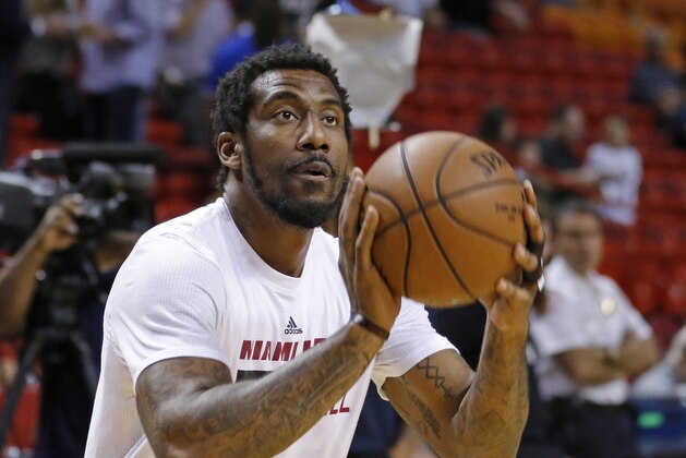 FILE - In this March 28, 2016, file photo, Miami Heat forward Amar'e Stoudemire shoots during warmups before the Heat met the Brooklyn Nets in an NBA basketball game, in Miami. After retiring from the NBA on July 26, Stoudemire signed a two-year contract Monday, Aug. 1, 2016,  to play for Israeli team Hapoel Jerusalem. Stoudemire says it was a very emotional decision for him and his family.  (AP Photo/Joe Skipper, File)