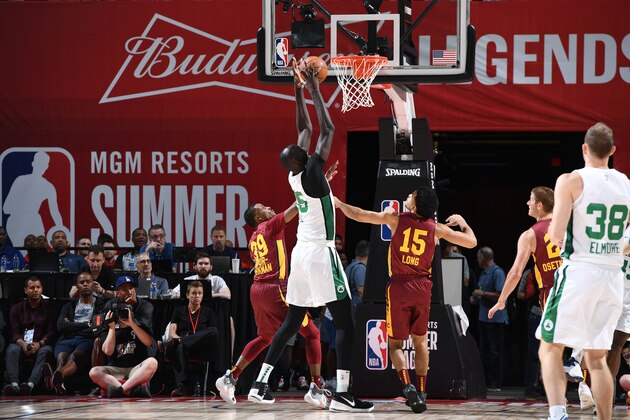 LAS VEGAS, NV - JULY 8: Tacko Fall #55 of the Boston Celtics rebounds the ball against the Cleveland Cavaliers on July 8, 2019 at the Thomas & Mack Center in Las Vegas, Nevada. NOTE TO USER: User expressly acknowledges and agrees that, by downloading and/or using this photograph, user is consenting to the terms and conditions of the Getty Images License Agreement. Mandatory Copyright Notice: Copyright 2019 NBAE (Photo by Garrett Ellwood/NBAE via Getty Images)