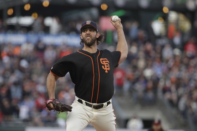 San Francisco Giants pitcher Madison Bumgarner throws against the St. Louis Cardinals during the first inning of a baseball game in San Francisco, Saturday, July 6, 2019. (AP Photo/Jeff Chiu)