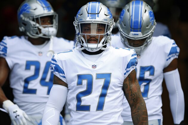 FILE - In this Dec. 16, 2018, file photo, Detroit Lions free safety Glover Quin enters the field before an NFL football game against the Buffalo Bills in Orchard Park, N.Y. The Lions have released Quin, cutting ties with the 33-year-old safety that had one year left on his contract. (AP Photo/Jeffrey T. Barnes, File)