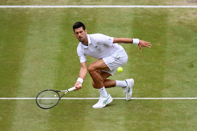 LONDON, ENGLAND - JULY 10: Novak Djokovic of Serbia plays a forehand in his Men's Quarter Final match against David Goffin of Belgium during Day Nine of The Championships - Wimbledon 2019 at All England Lawn Tennis and Croquet Club on July 10, 2019 in London, England. (Photo by Mike Hewitt/Getty Images)